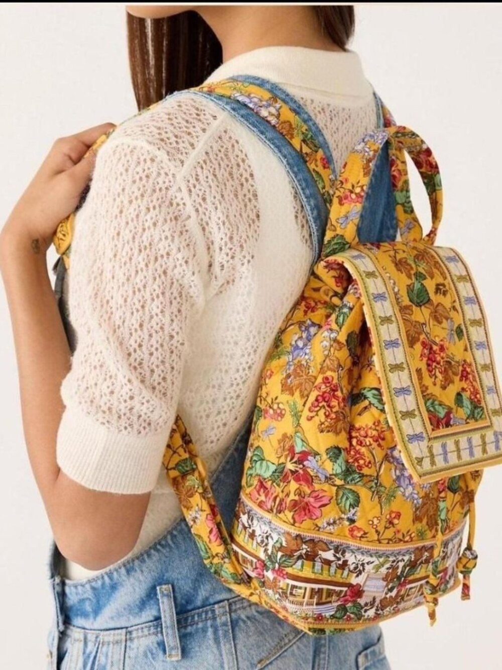 Vera Bradley gilmorw girls yellow floral print backpack with red, blue, and gree